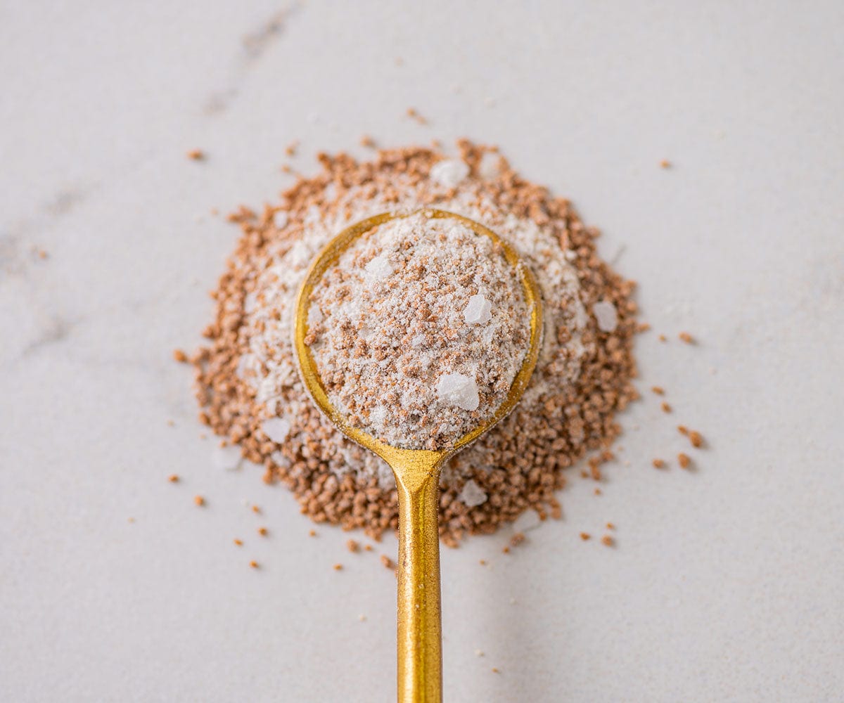 Salted Caramel Spice in a golden spoon, close up shot